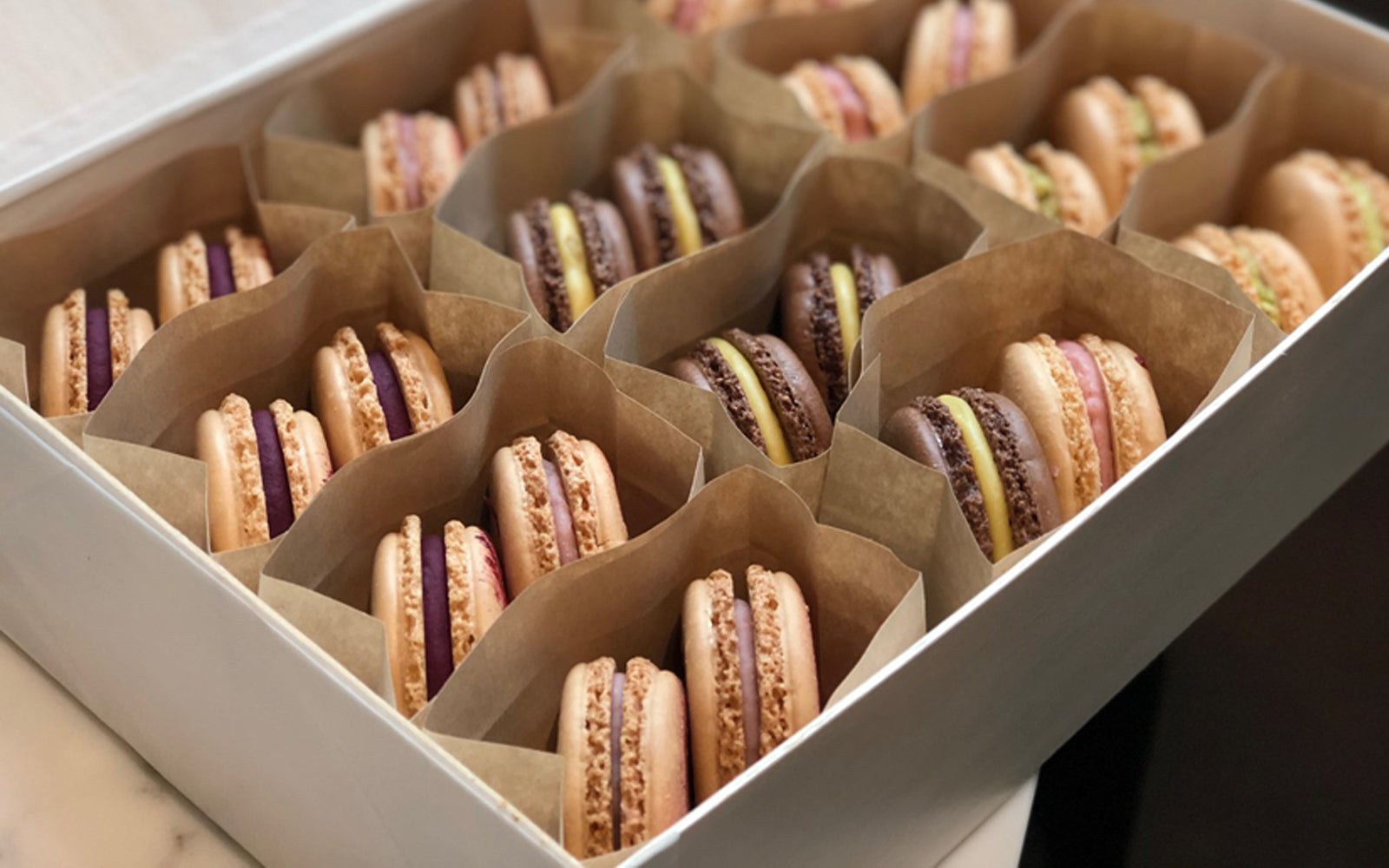 Our Basla Wood Collapsible Box Displaying Macaons